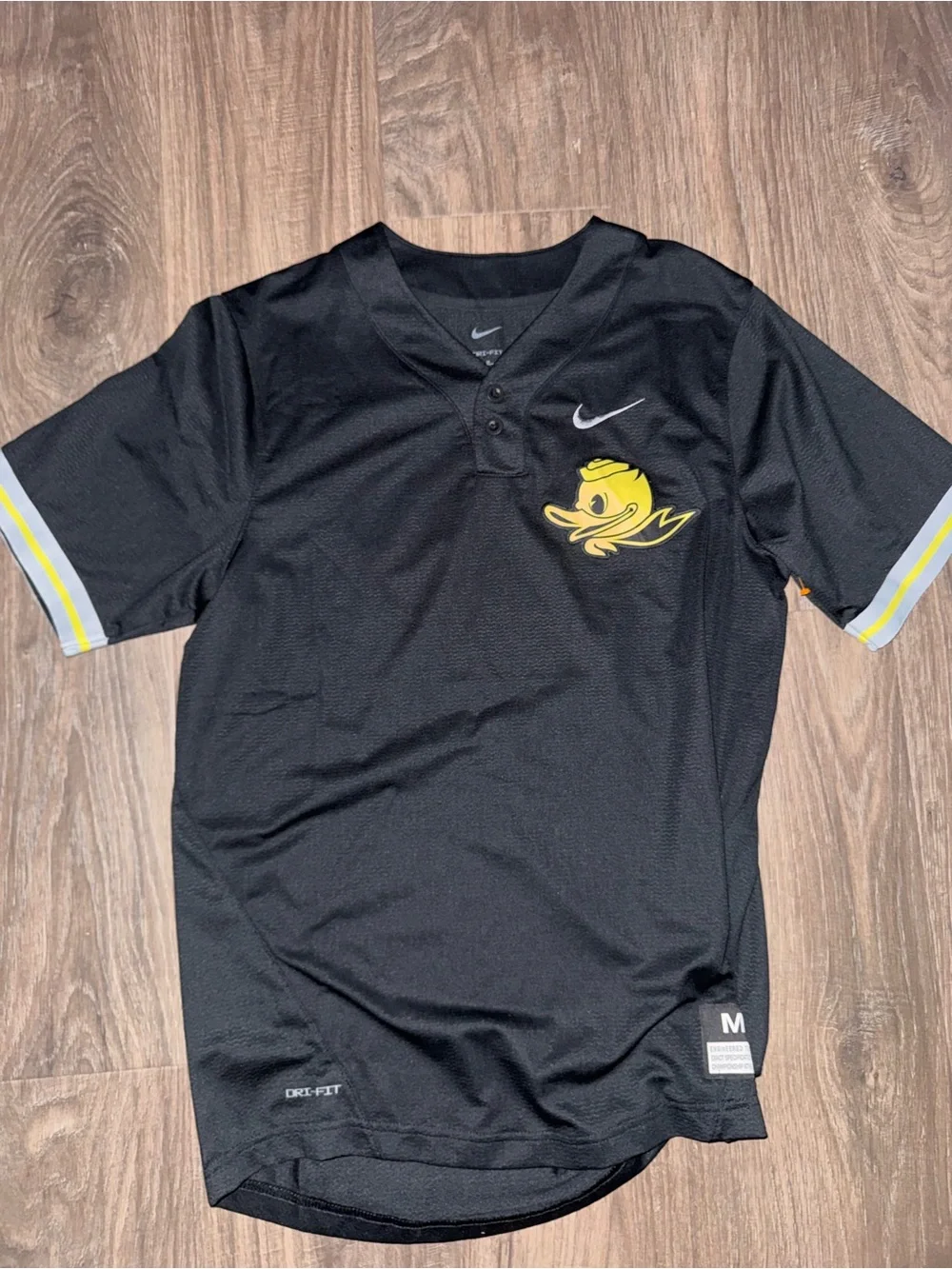 Nike Black Short-Sleeve Athletic Shirt with Yellow Duck Logo